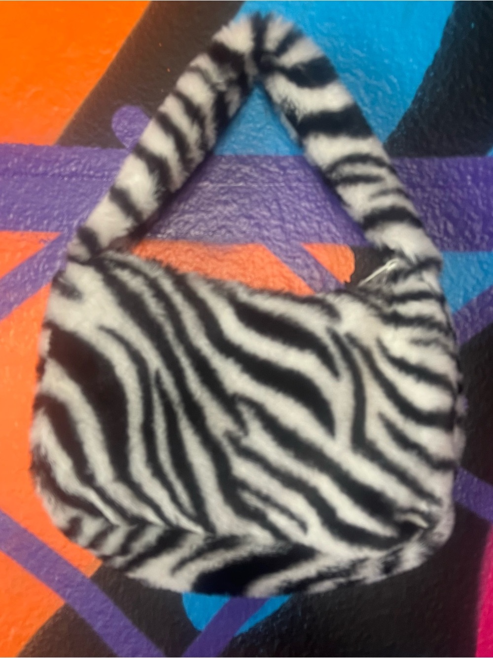 Black & white zebra print faux fur handbag